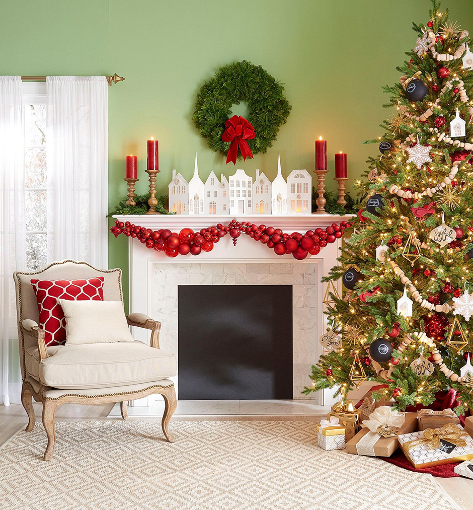 Festive Christmas mantel decoration with wreath, garland, and budget-friendly holiday styling