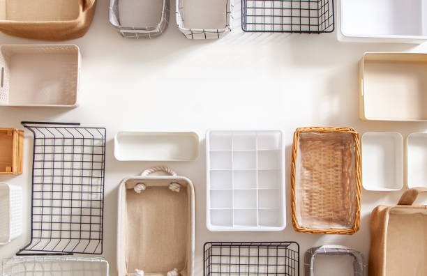 Closet organization boxes and steel wire baskets.