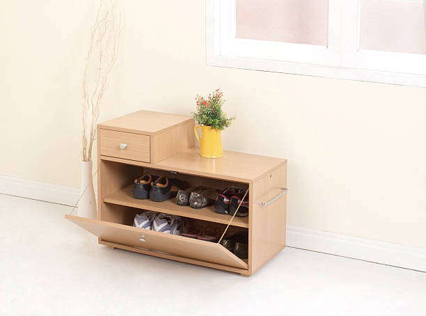 Minimalist wooden shoe cabinet with open compartments and top drawer