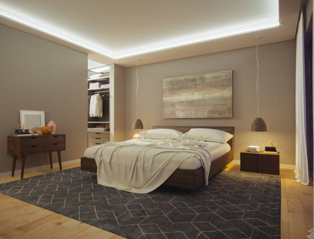 Minimalist bedroom with neutral tones and LED ceiling lights