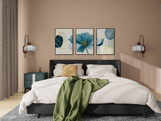Contemporary bedroom with floral wall art and pendant lights