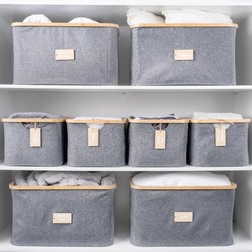 Organized gray fabric bins with labels