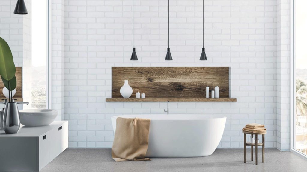 Minimalist bathroom with a white tub and wood accent shelf