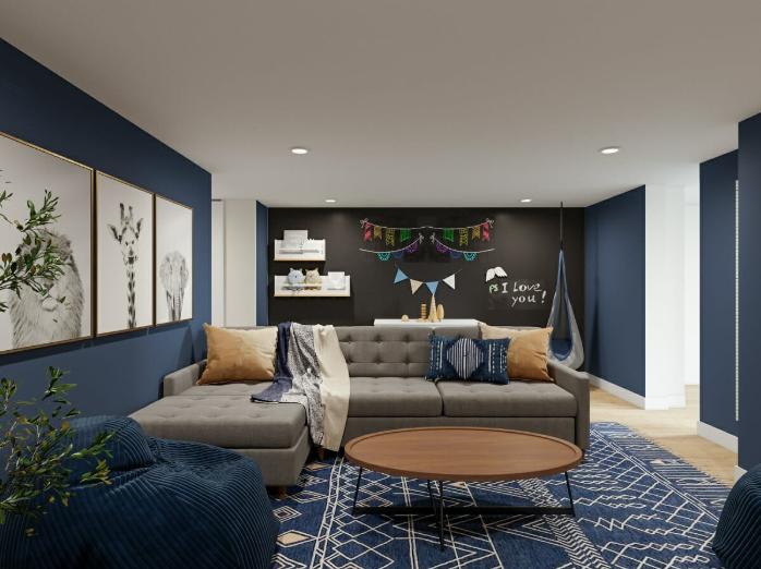 a living room with a couch, rug, and a coffee table matching a blue color palette