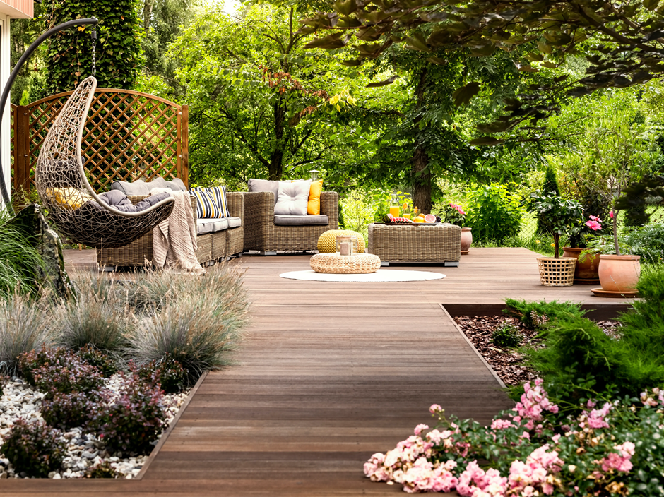 modern wooden deck patio with outdoor furniture and plants for relaxing backyard design