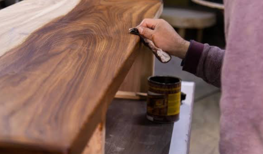 Applying finish to wooden surface