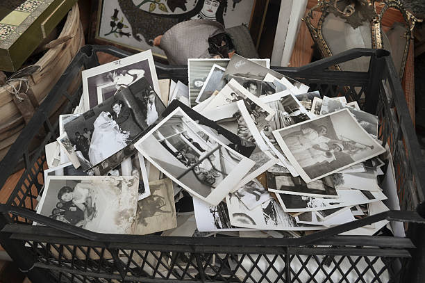A bin of black and white photos from a wedding.