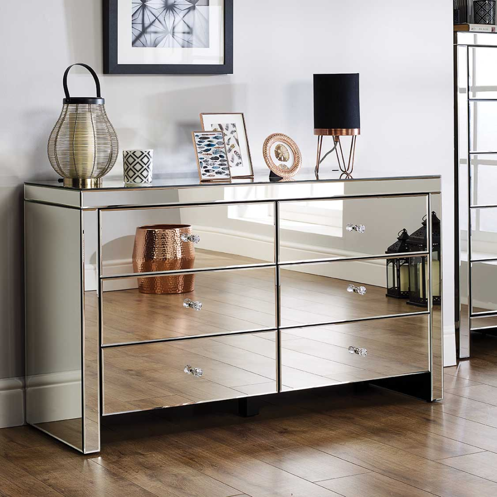 modern mirrored dresser with crystal drawer pulls and stylish living room decor accents