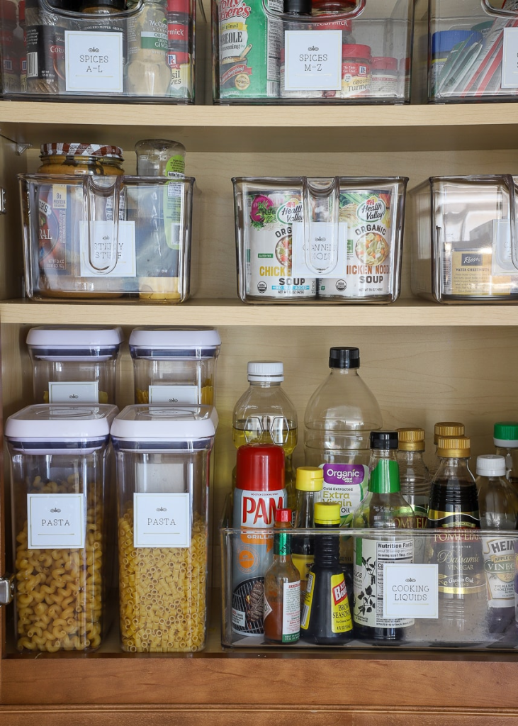 organized pantry shelves with clear storage containers for spices pasta and cooking essentials
