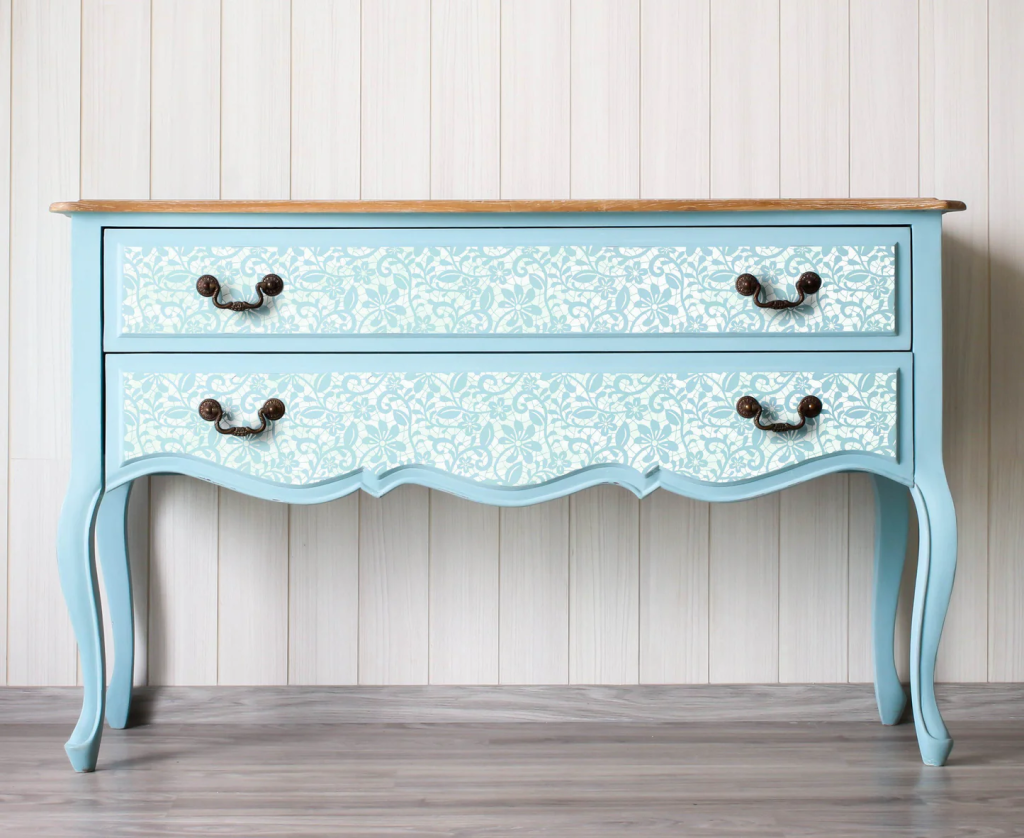 vintage blue painted console table with floral drawer design and curved legs