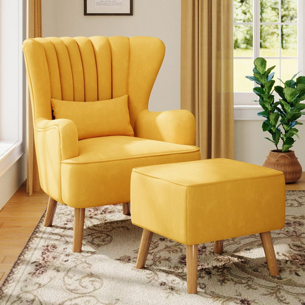 yellow velvet accent chair with matching ottoman in a cozy living room