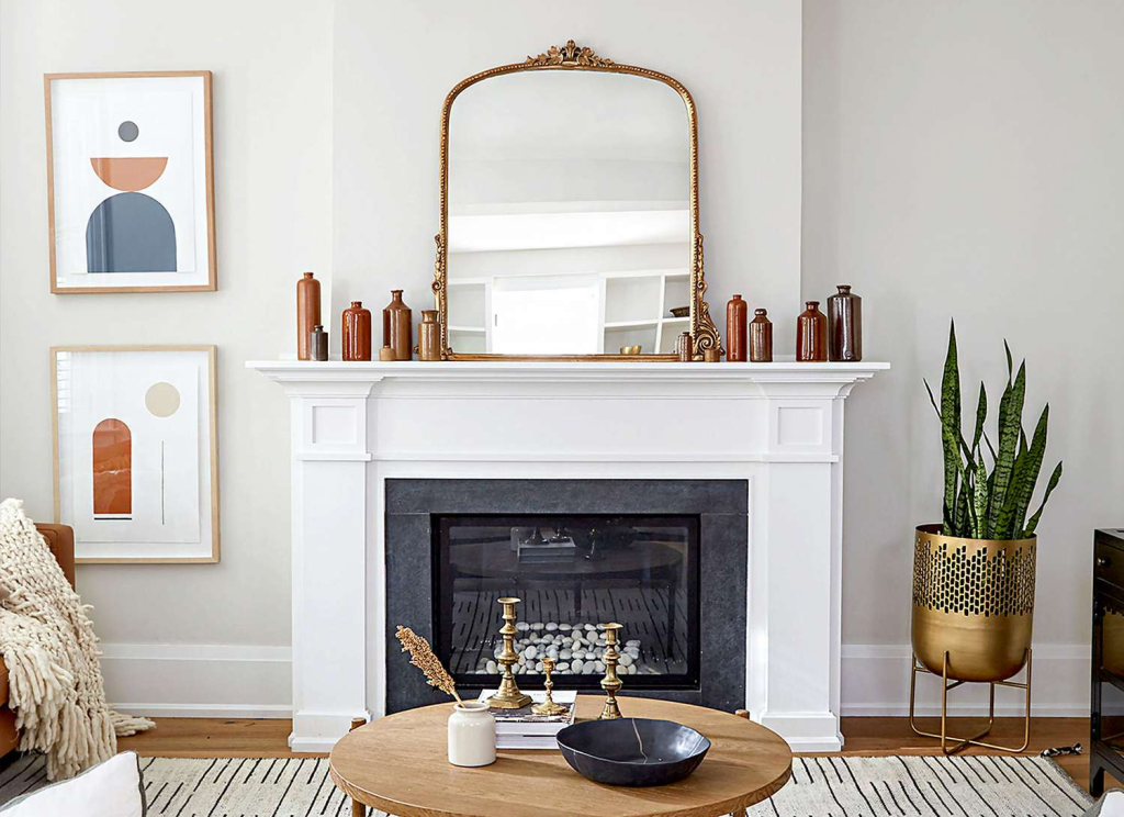 minimalist white fireplace mantel with decorative mirror and modern living room decor