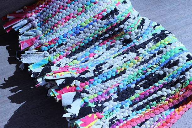 Colorful braided rag rug made from recycled fabric strips