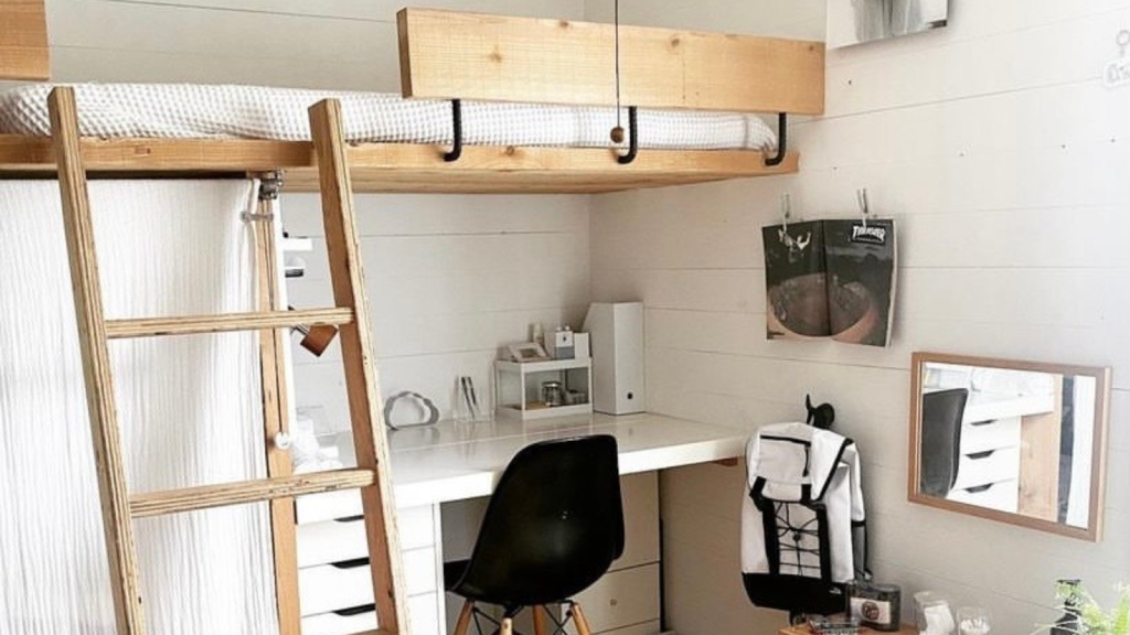 This loft bed design tucks sleep space up high and leaves room for a desk below.