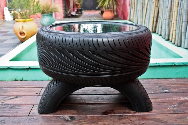 Coffee table made out of one and a half tires.