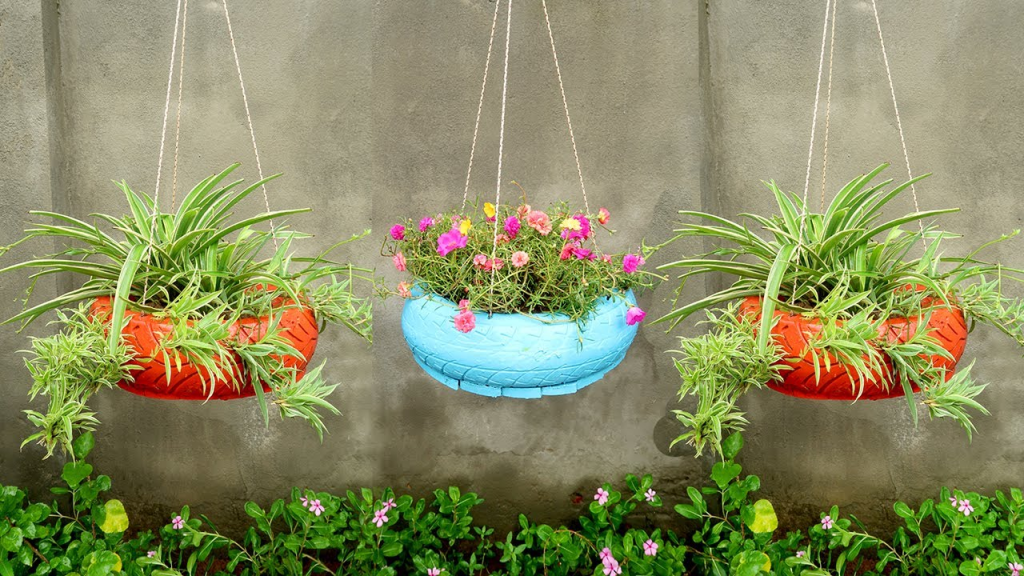 Hanging mini tire planters.