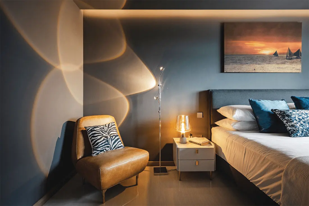 Thoughtful lighting choices transform the room into a personal sanctuary
