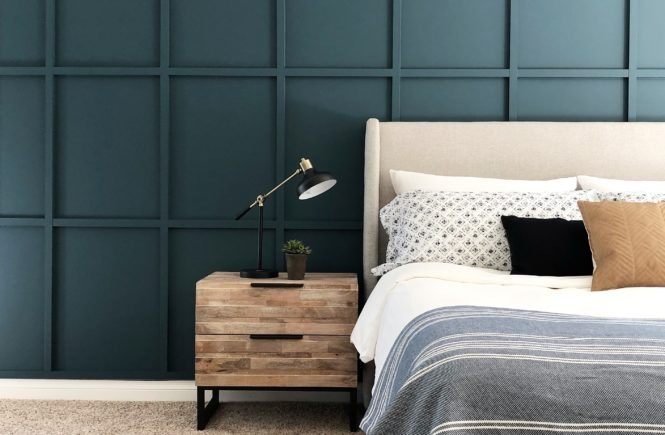 Dark Blue/green-ish peel-and-stick paneled accent wall.