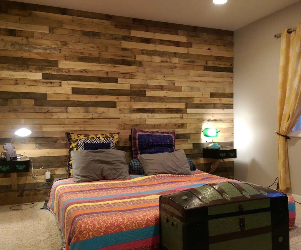 Pellet board pieces layered on the backwall creating an accent wall design in this bedroom.