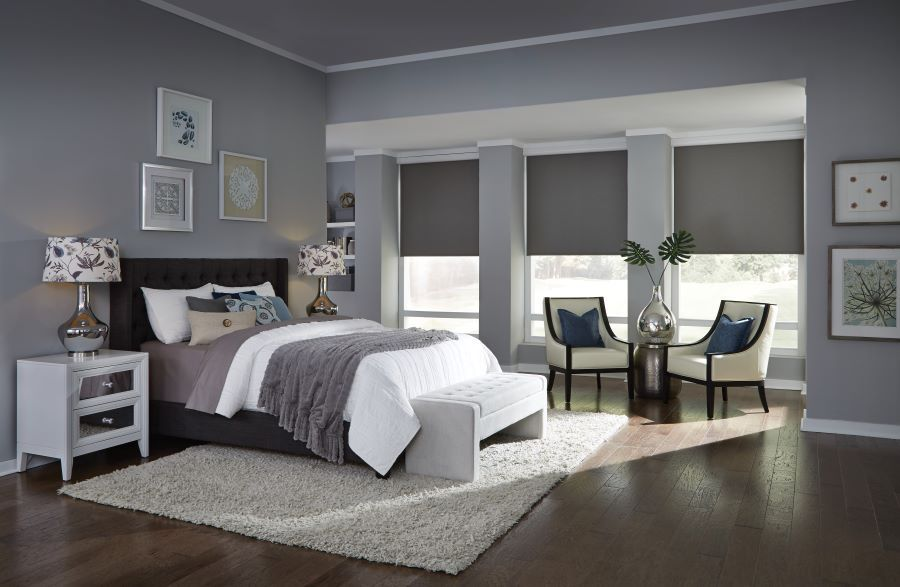 Motorized blinds gliding down to set the perfect mood in your luxury retreat