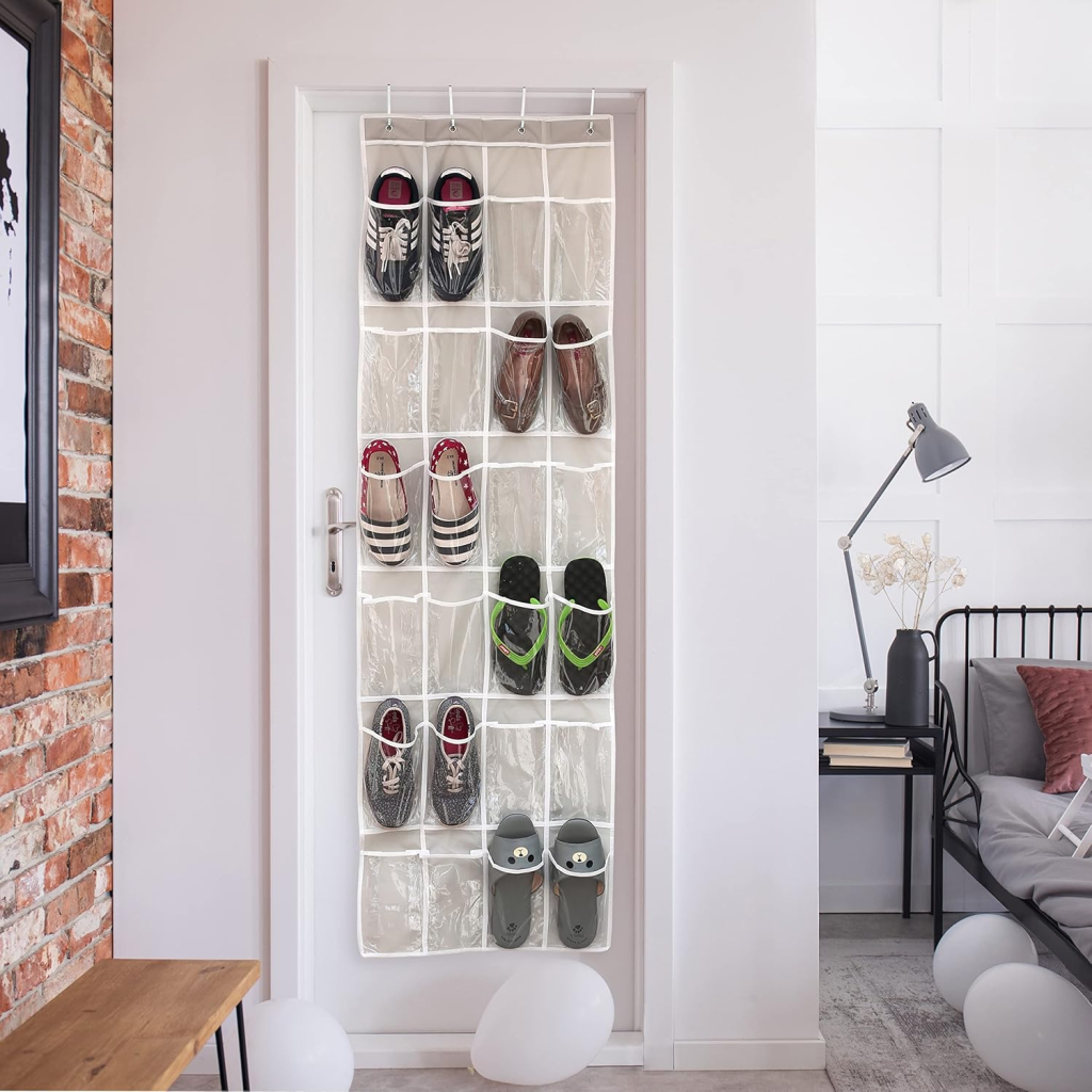 Shoe organizer on the back of a bedroom door.