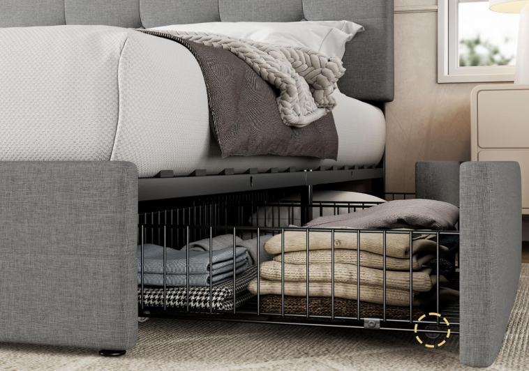 A close up of the Allewie Upholstered Queen Size Platform Bed storage compartment highlighting the rolling wheel under the drawer making access easy.