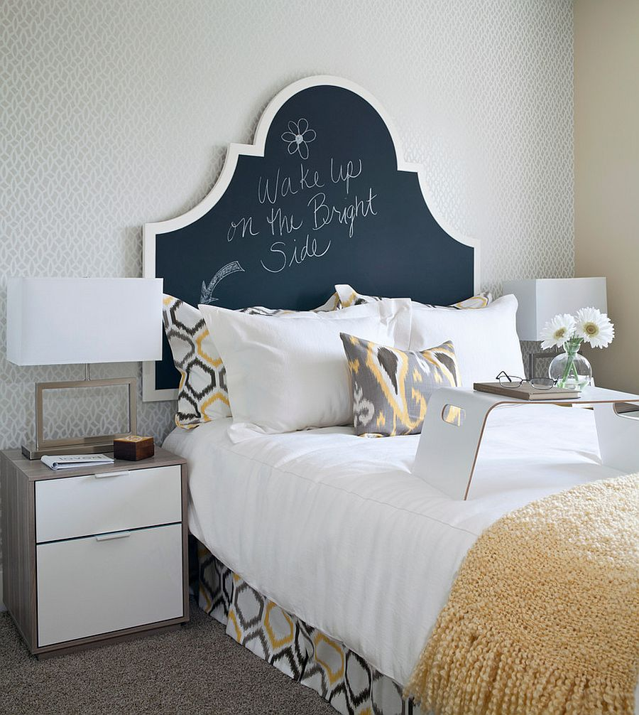A headboard chalkboard in a bedroom.