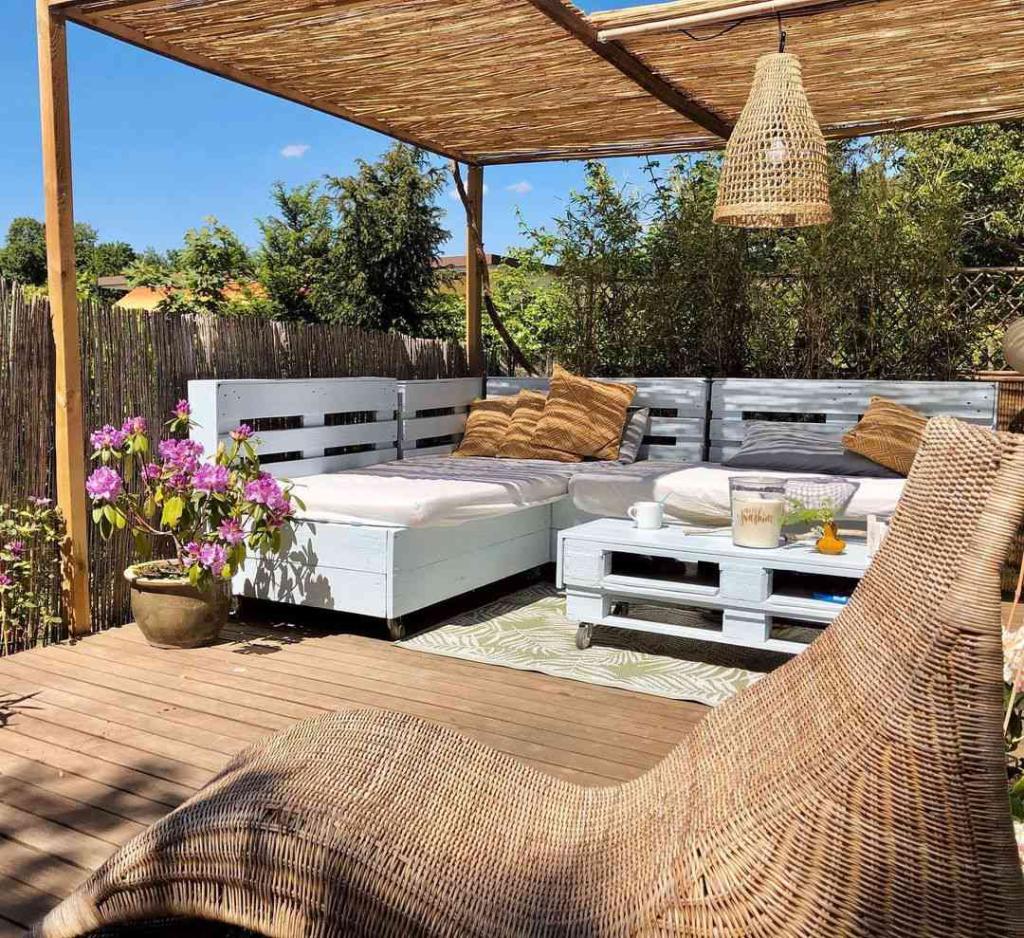 A bamboo and pallet decorated patio space.
