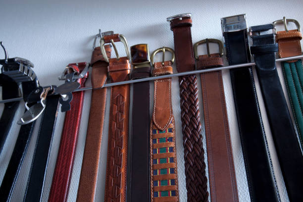 Belt organizer against a wall.
