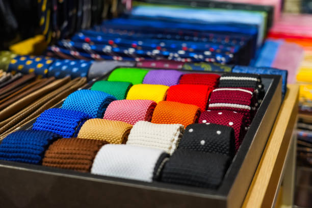 Properly folded belts and ties in drawer insertions