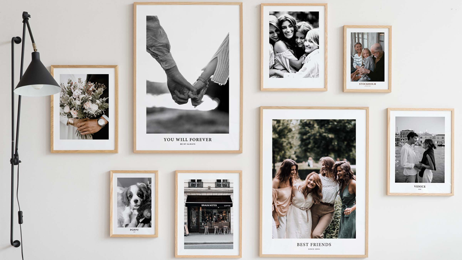 Living room gallery wall with vintage art in thrifted frames