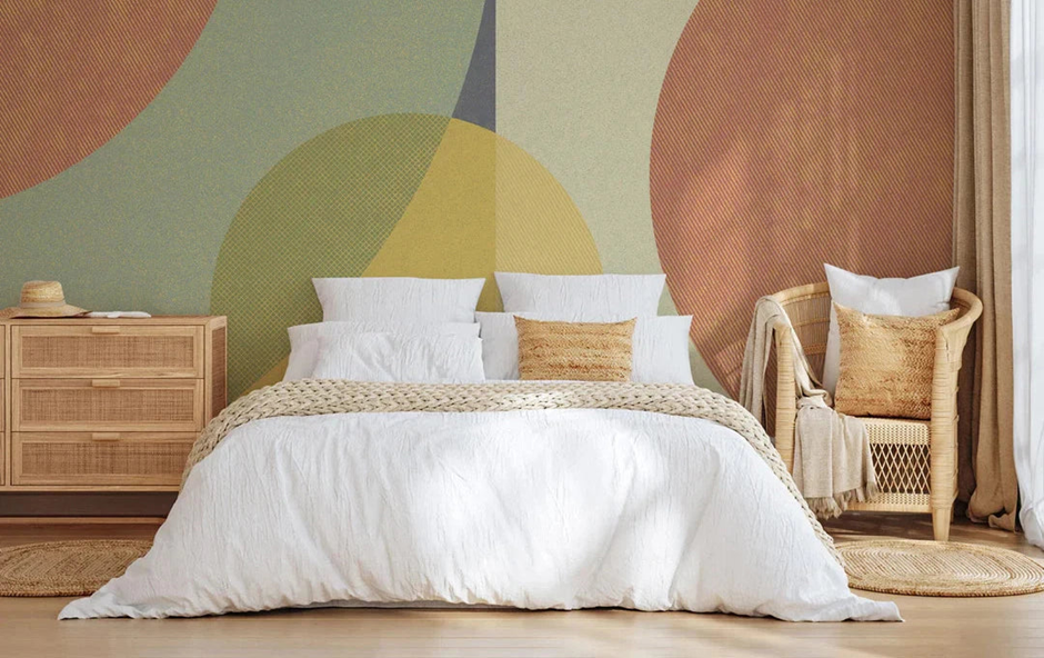 Cozy bedroom with an artistic wall mural displaying nature-inspired artwork for a peaceful vibe.