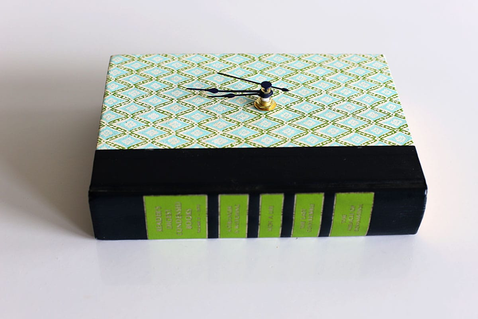 DIY old book craft turned into a unique decorative clock for creative upcycling.