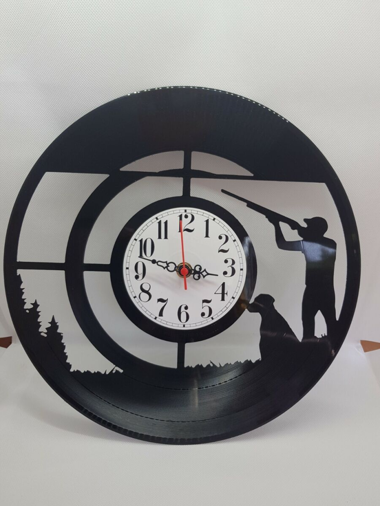 Vinyl record wall clock with hunter silhouette.