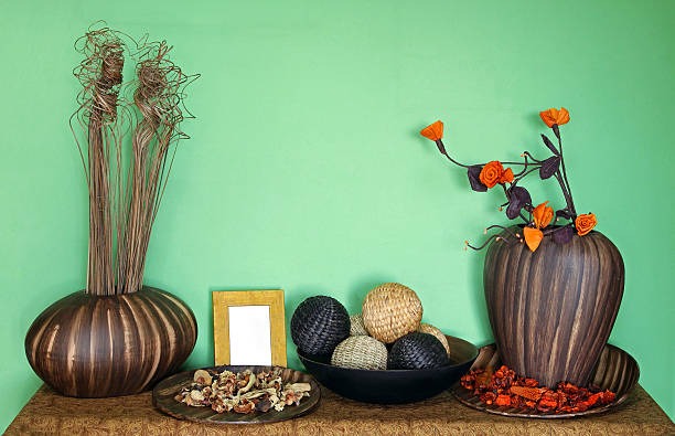 A side table with decorations on top.
