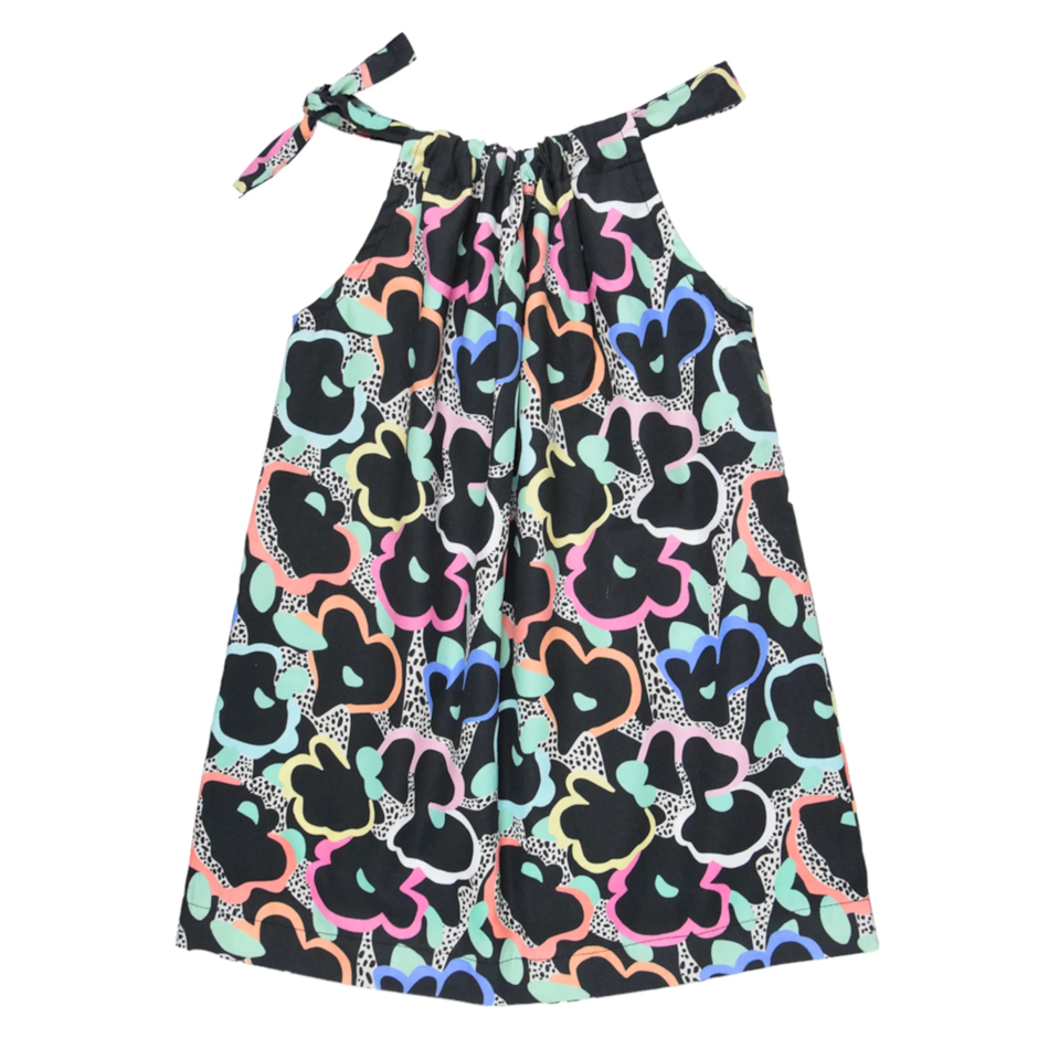 Handmade pillowcase dress with bold floral print.