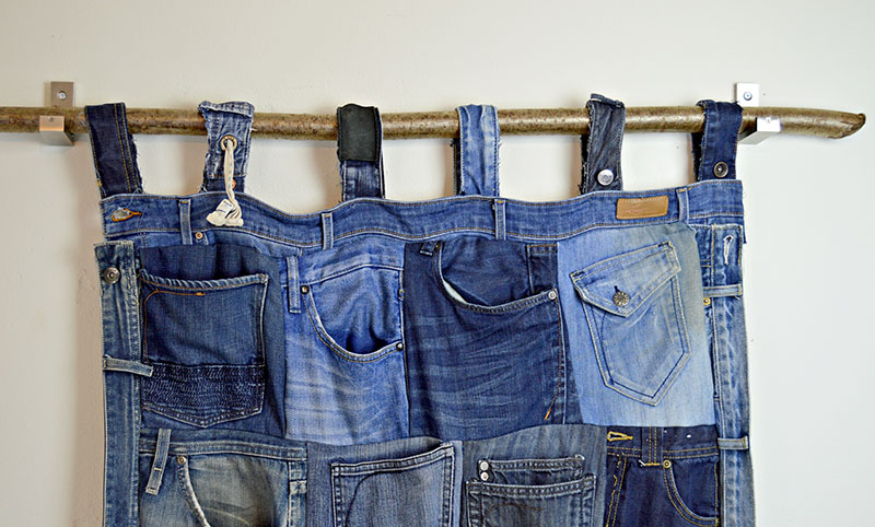 A unique rack of demin jean pockets.