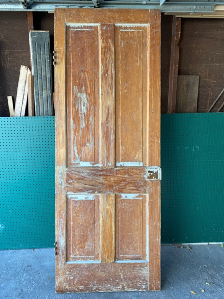 Old wooden door with chipped paint