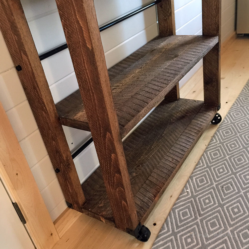 Dark stained rolling pallet shelf