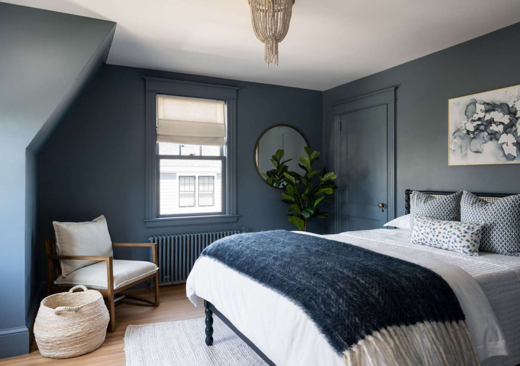 A blue gray toned bedroom.