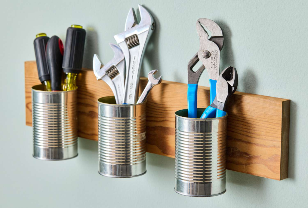 Organized home office desk with metal storage tray, stationery, laptop, and minimalist decor