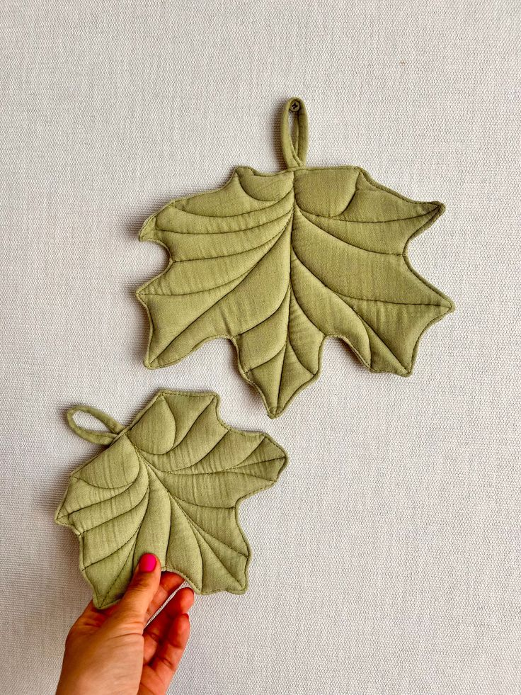 Leaf-shaped quilted pot holders made from cotton fabric for kitchen decor