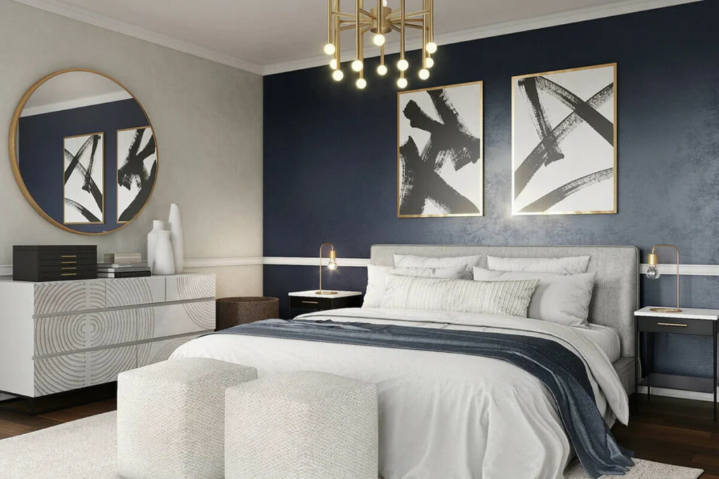 Contemporary bedroom with navy accent wall, abstract wall art, modern lighting, and white bedding