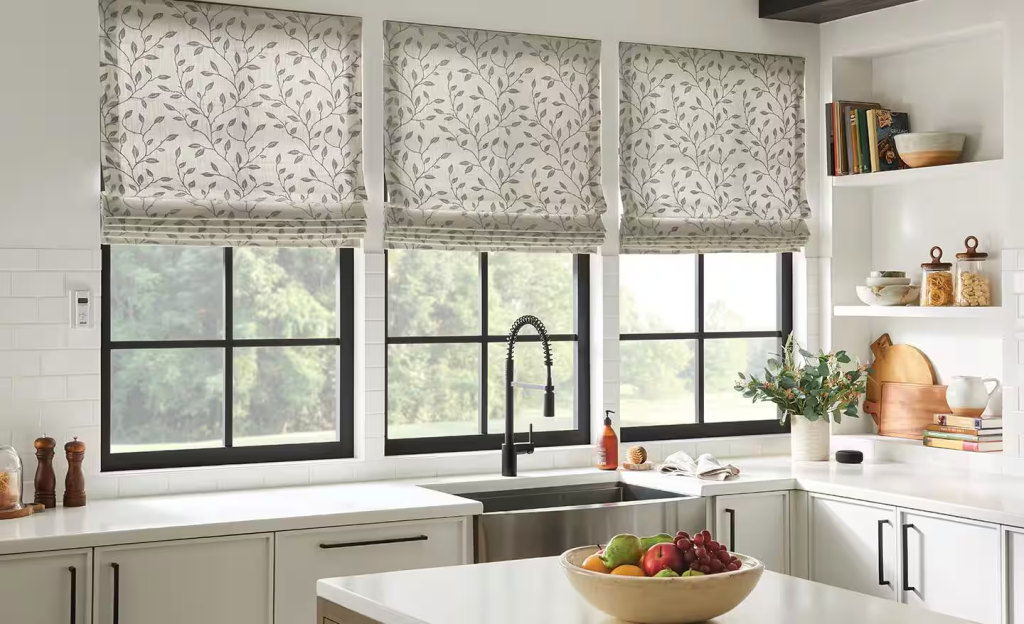 Kitchen windows with floral patterned roman shades and modern farmhouse decor