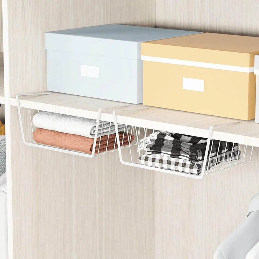 Closet shelf storage with fabric boxes and under shelf wire baskets for organizing clothes and linens