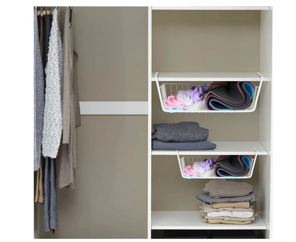 Closet storage with wire shelf baskets holding folded clothes and accessories for better organization