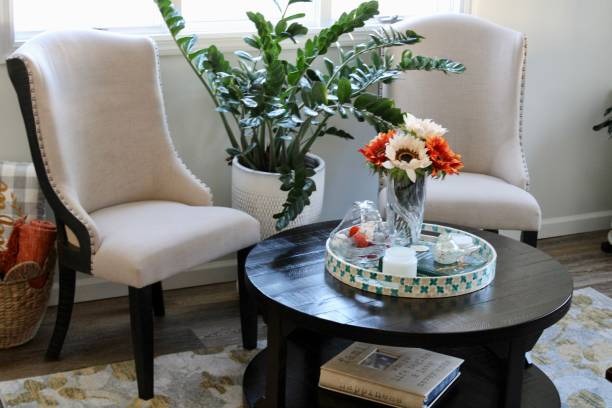 Comfortable sitting area with fresh flowers and plants