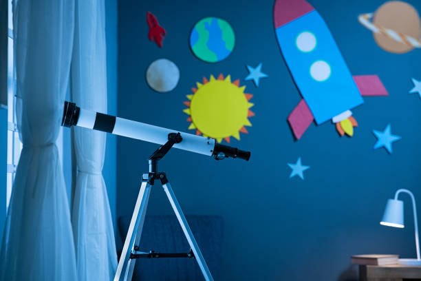 Telescope in a space themed bedroom.