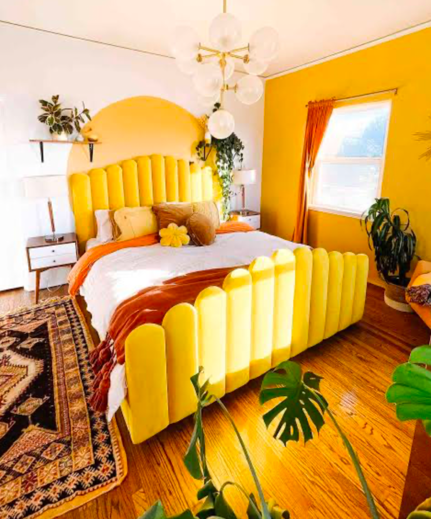 Sunny yellow bedroom with modern furniture