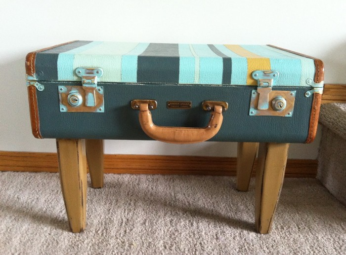 Repurposed suitcase as a small table with legs